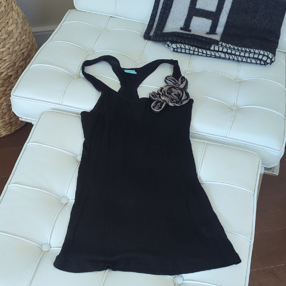 Elegant Black Sleeveless Top with Floral Accent